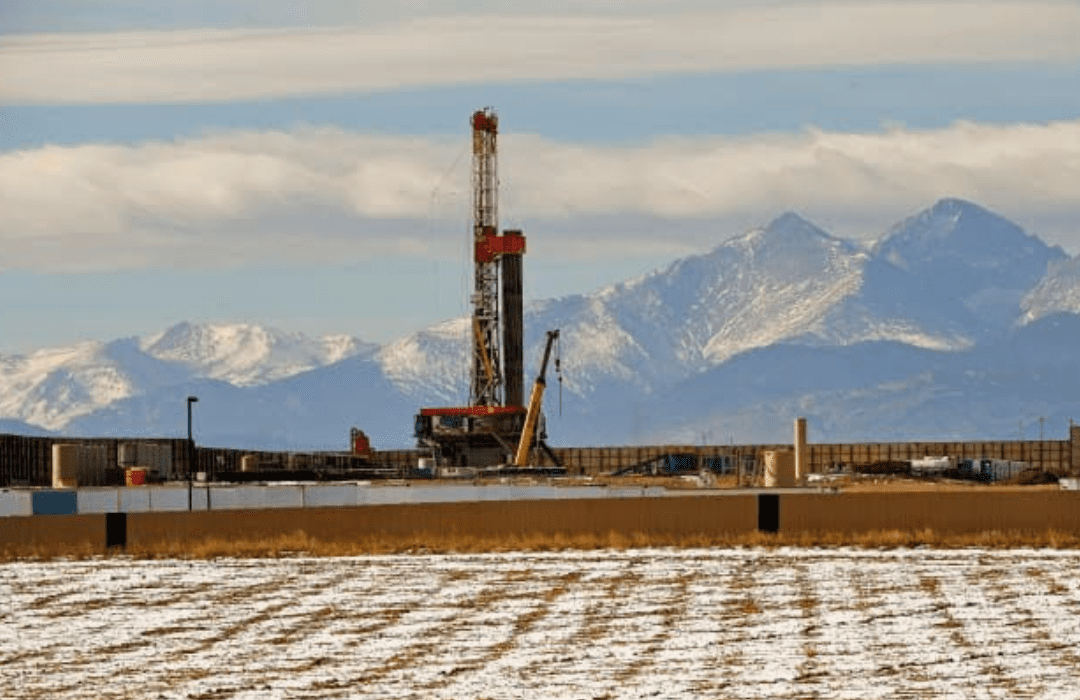 Fracking with mountains in the background